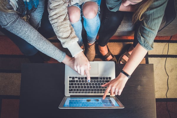 there people in front of a laptop | Photo by John Schnobrich on Unsplash