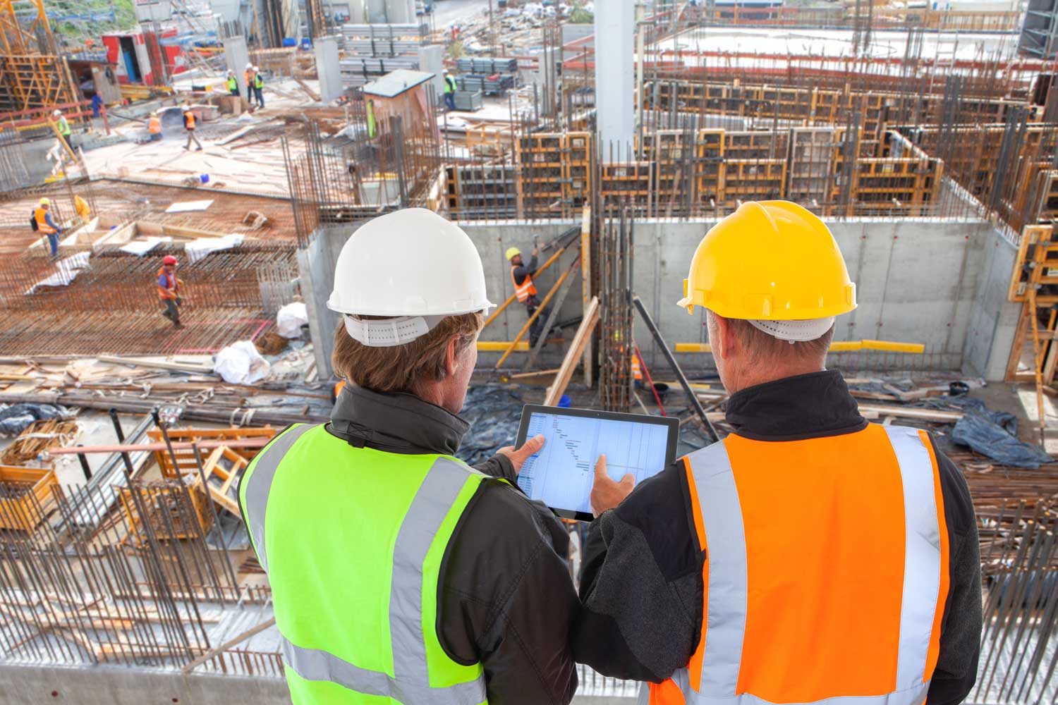 two-men-construction-tablet